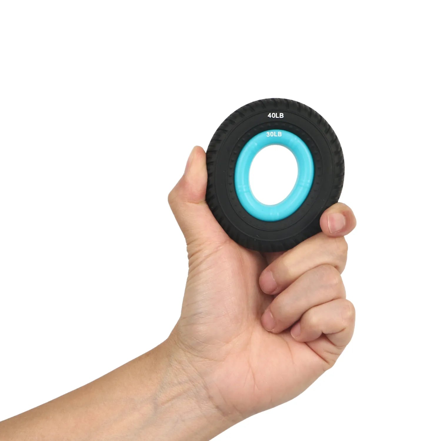 A hand holding a grip strength hand dynamometer. The device has a black outer ring with "40LB" marked on it and a blue inner ring with "30LB" marked. It is a tool for grip strength measurement, suitable for isometric grip exercises. Keywords: grip strength hand dynamometer, grip strength measurement tool, isometric grip exercises.